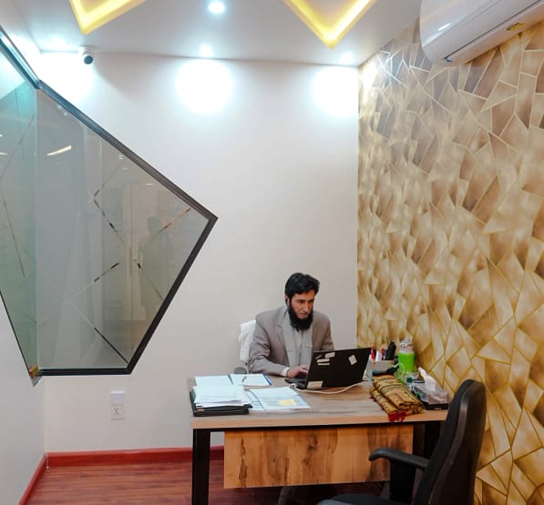 Hr Department head sir jhangeer is working in his office